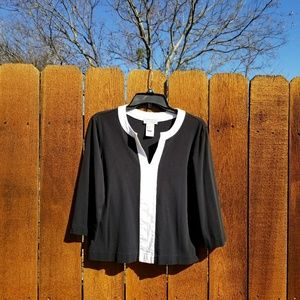 Black and white sweater/blouse.